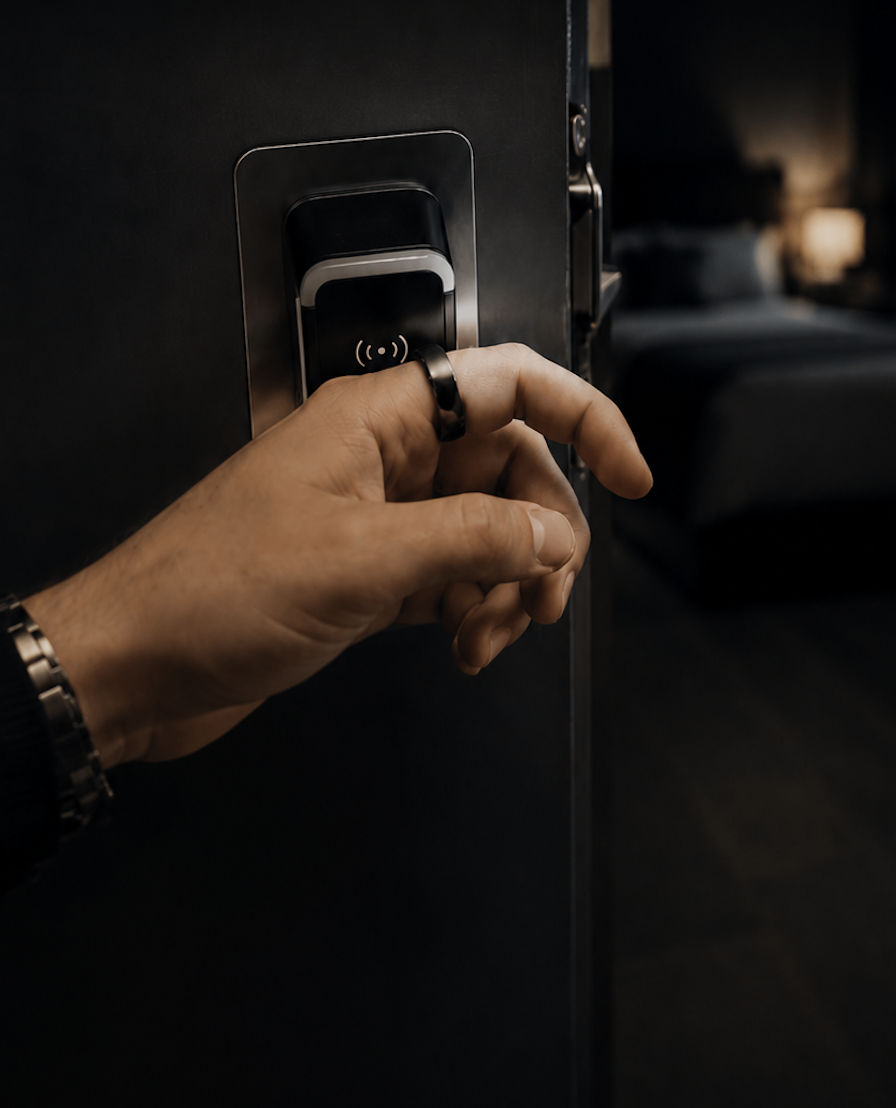 A HALOKEY ring tapping a room door reader